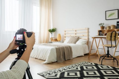 Blogger,Taking,A,Photo,Of,A,Modern,Bedroom